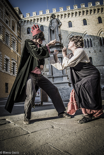 Italian theatre show in front of the Monte dei Paschi di Siena bank Italian theatre show in front of the Monte dei Paschi di Siena bank
