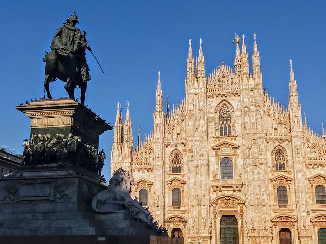 Milan Cathedral and Statue of King Victor Emmanuel II in the Cathedral Square Milan Cathedral and Statue of King Victor Emmanuel II in the Cathedral Square