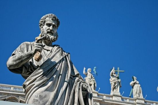 Saint Peter's statue in front of Saint Peter's Basilica in Rome