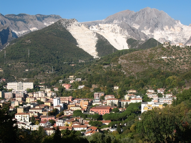 Carrara at the foot of the Apuan Alps Carrara and the Apuan Alps