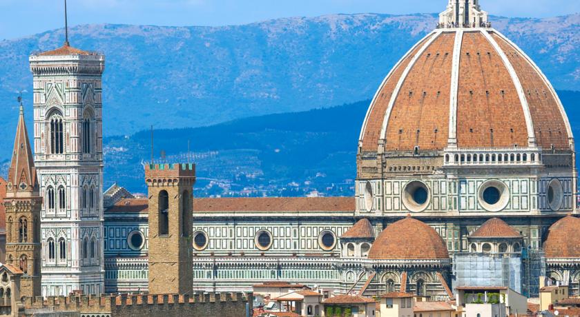 Florence - The Cathedral, dominated by Brunelleschi's Cupola and Giotto's Campanile Florence - The Cathedral, dominated by Brunelleschi's Cupola and Giotto's Belltower