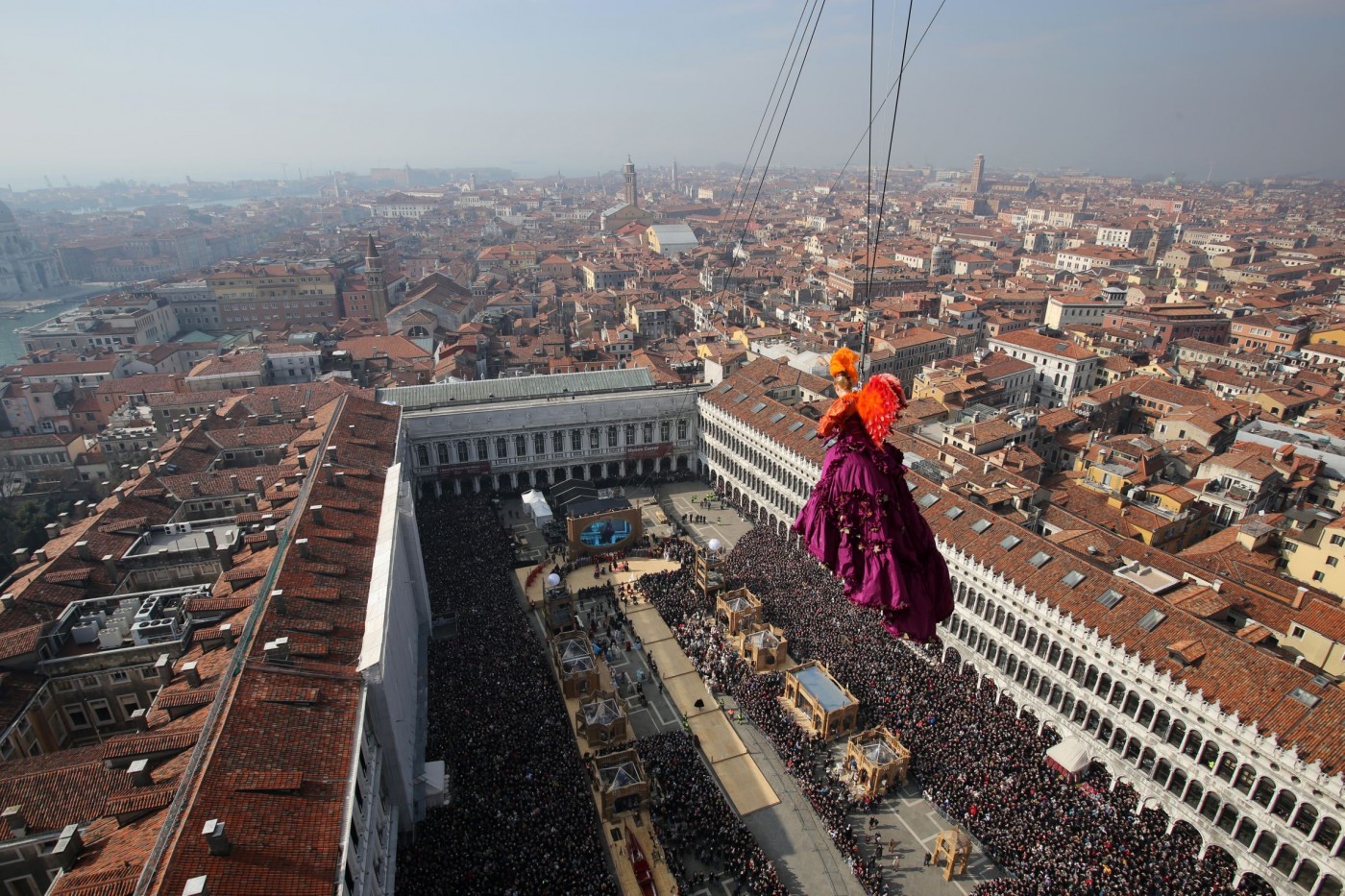 Venice Carnival Flight of the Angel over St Mark's Square Venice Carnival Flight of the Angel over St Mark's Square
